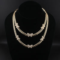 10K Gold Cuban Link Chain with Butterflies