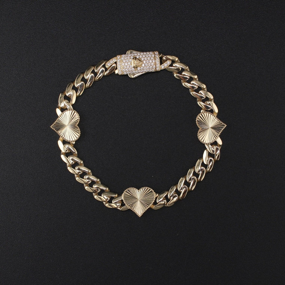 10K gold Heart Bracelet on black background