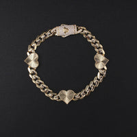 10K gold Heart Bracelet on black background