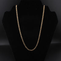 14K Figaro 15g YG Chain 22in