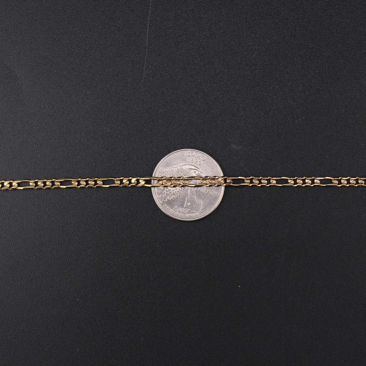 14K Figaro 15g YG Chain 22in