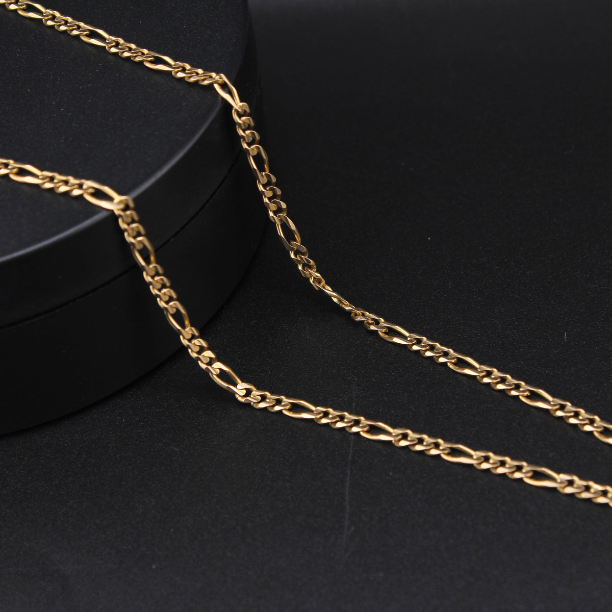 14K Figaro 15g YG Chain 22in