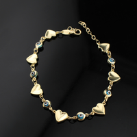 Pulsera de oro de 14 quilates con corazón y ojo turco