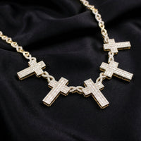 Cadena de oro de 14 quilates con cruz de diamantes e infinito real