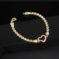 Pulsera de corazón de oro rosa de 10K real