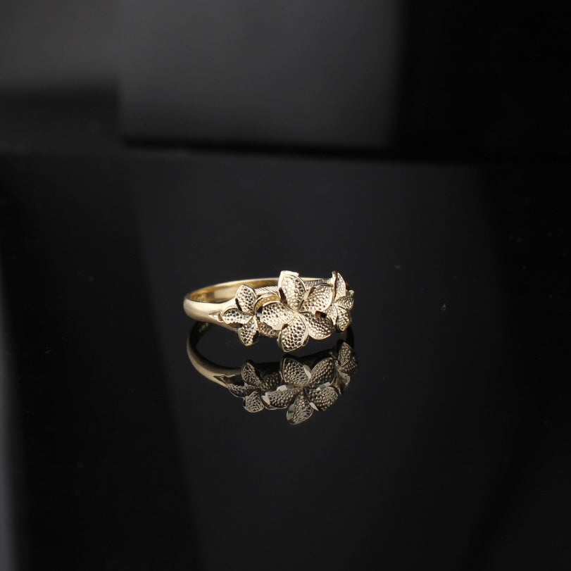 Anillo de oro amarillo de 10K con flor