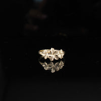 Anillo de oro amarillo de 10K con flor