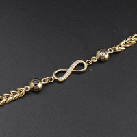 Pulsera de oro de 10K con símbolo de infinito