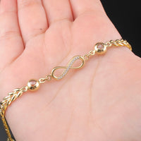 Pulsera de oro de 10K con símbolo de infinito