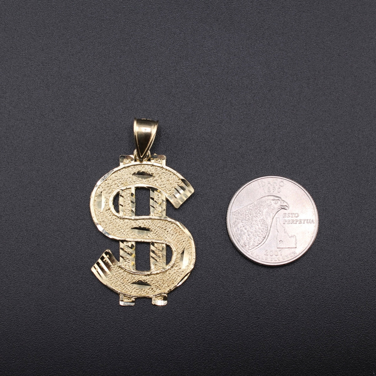 Dije con el signo de dólar de oro de 10K auténtico