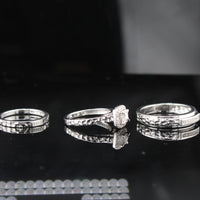 Anillos y juego de bandas de boda de diamantes