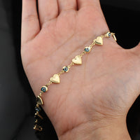 Pulsera de oro de 14 quilates con corazón y ojo turco
