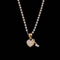 10K Real Gold Heart with Key & Chain - on black background - ICEbyAK