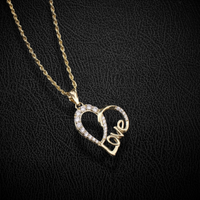 Colgante de oro de 10K con corazón de amor real